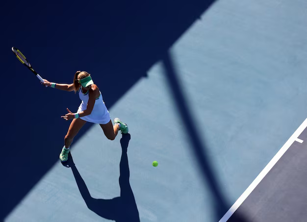 Tennis player hitting a tennis ball