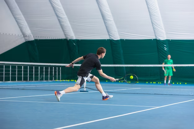 A man playing tennis on the court