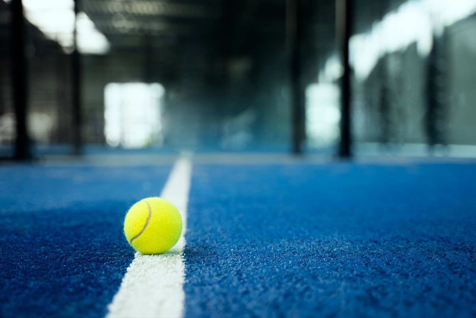 Tennis ball on white line